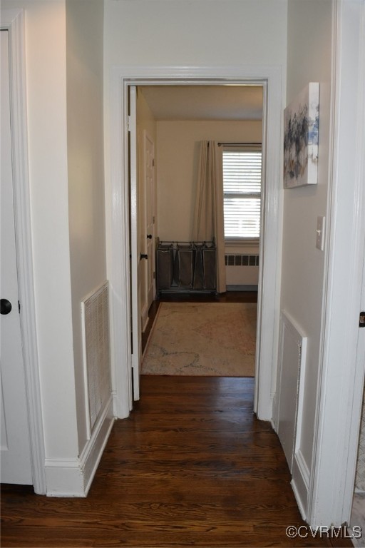 1118 West Osborn Road Farmville, VA 23901 - Photo 18 of 38 Corridor with radiator heating unit and dark hardw