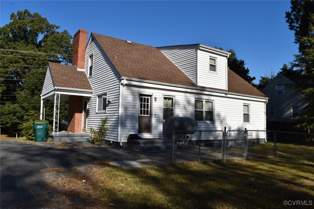 1118 West Osborn Road Farmville, VA 23901 - Photo 24 of 38 Rear view of property with a lawn