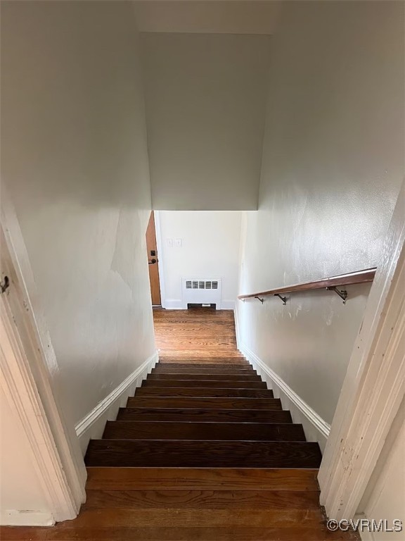 1118 West Osborn Road Farmville, VA 23901 - Photo 38 of 38 Staircase featuring wood-type flooring and radiato