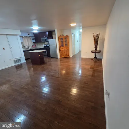 a view of a kitchen with a sink