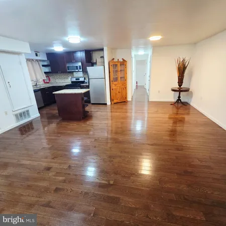a view of kitchen and dining room with furniture