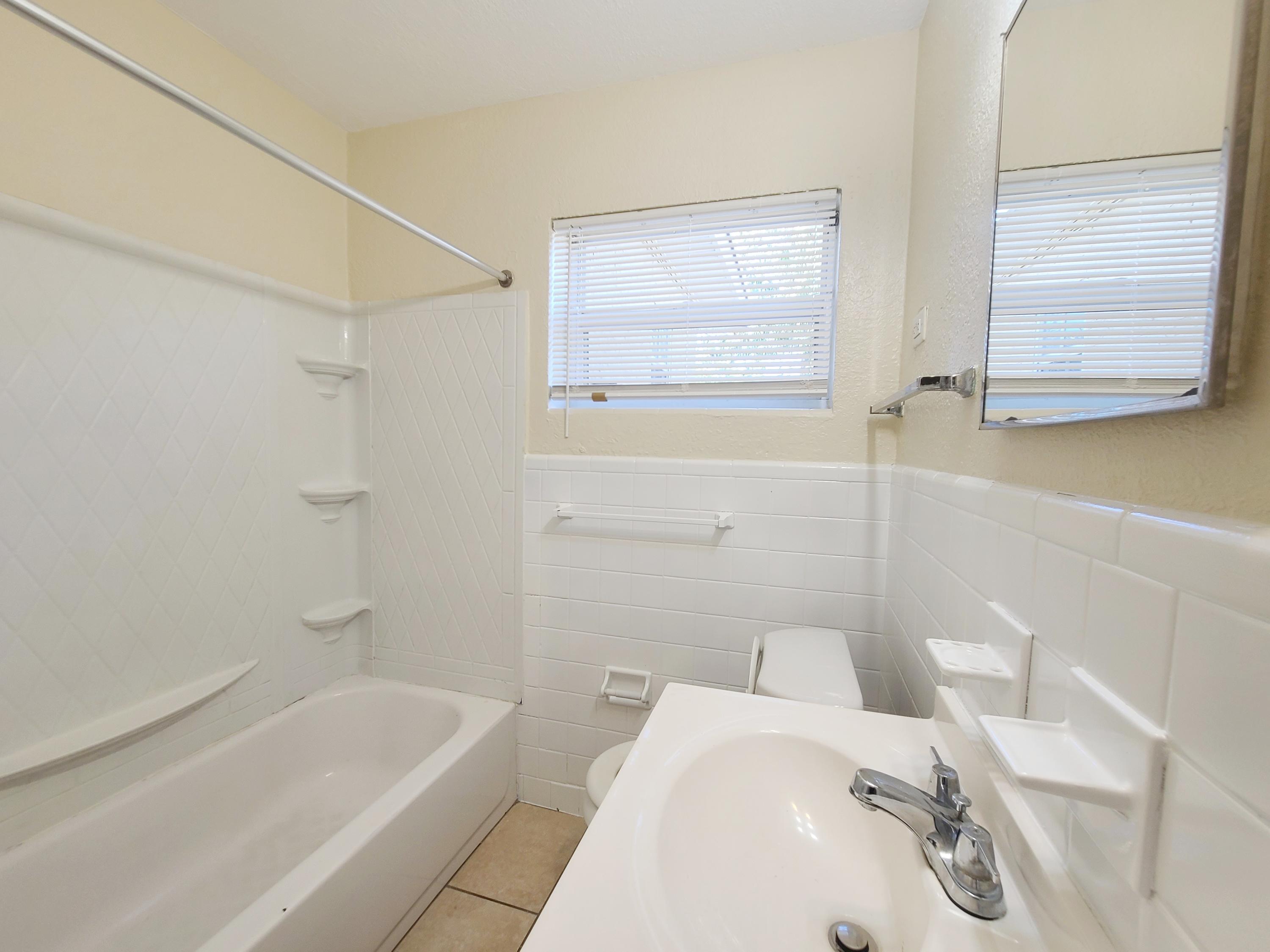 146 West 17th Street Riviera Beach, FL 33404 - Photo 16 of 18 Guest Bathroom
