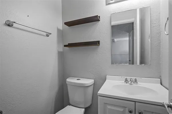 a bathroom with a sink and a toilet