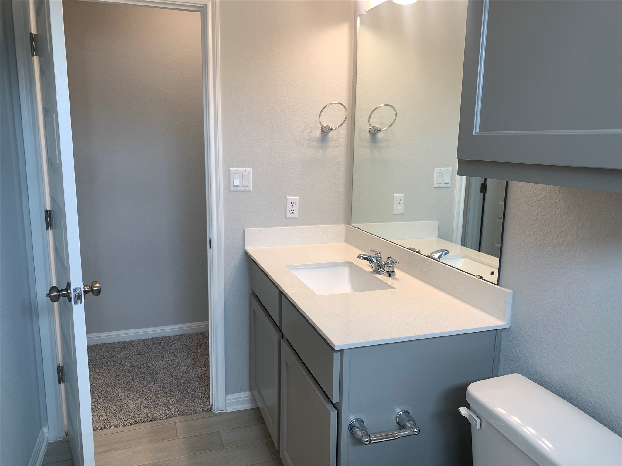 2948 Sage Ranch Drive Leander, TX 78641 - Photo 21 of 28 A well-appointed bathroom with a modern vanity and ample counter space.