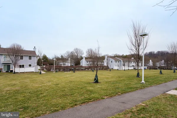a view of a yard with a slide