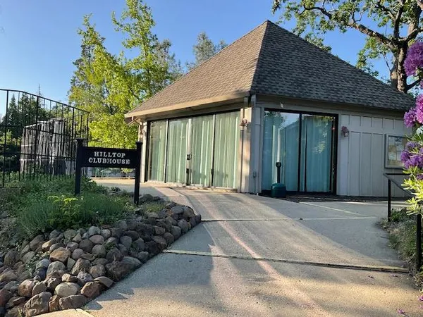 a view of a house that has a small garden