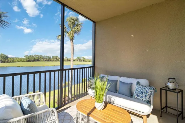 a view of a balcony with furniture