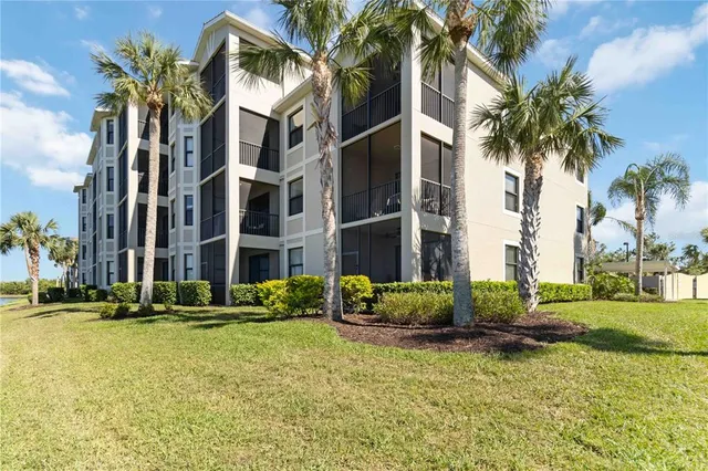 a view of multiple house with a yard