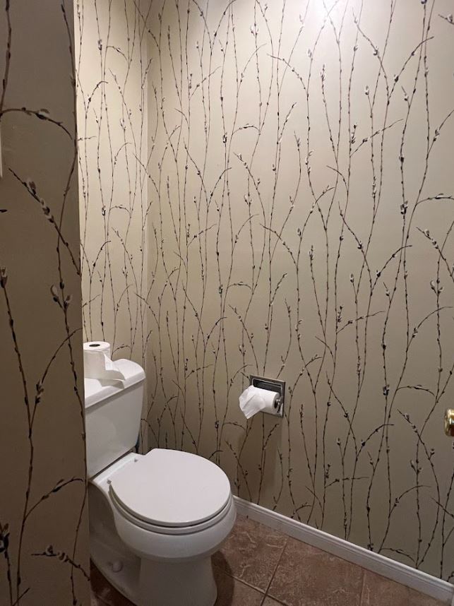 2813 Rio Grande Street, Unit 3 Austin, TX 78705 - Photo 19 of 21 a white toilet sitting next to a shower curtain