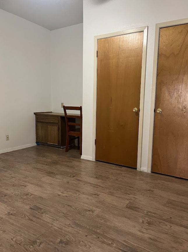 2813 Rio Grande Street, Unit 3 Austin, TX 78705 - Photo 10 of 21 a view of an empty room with furniture and closet