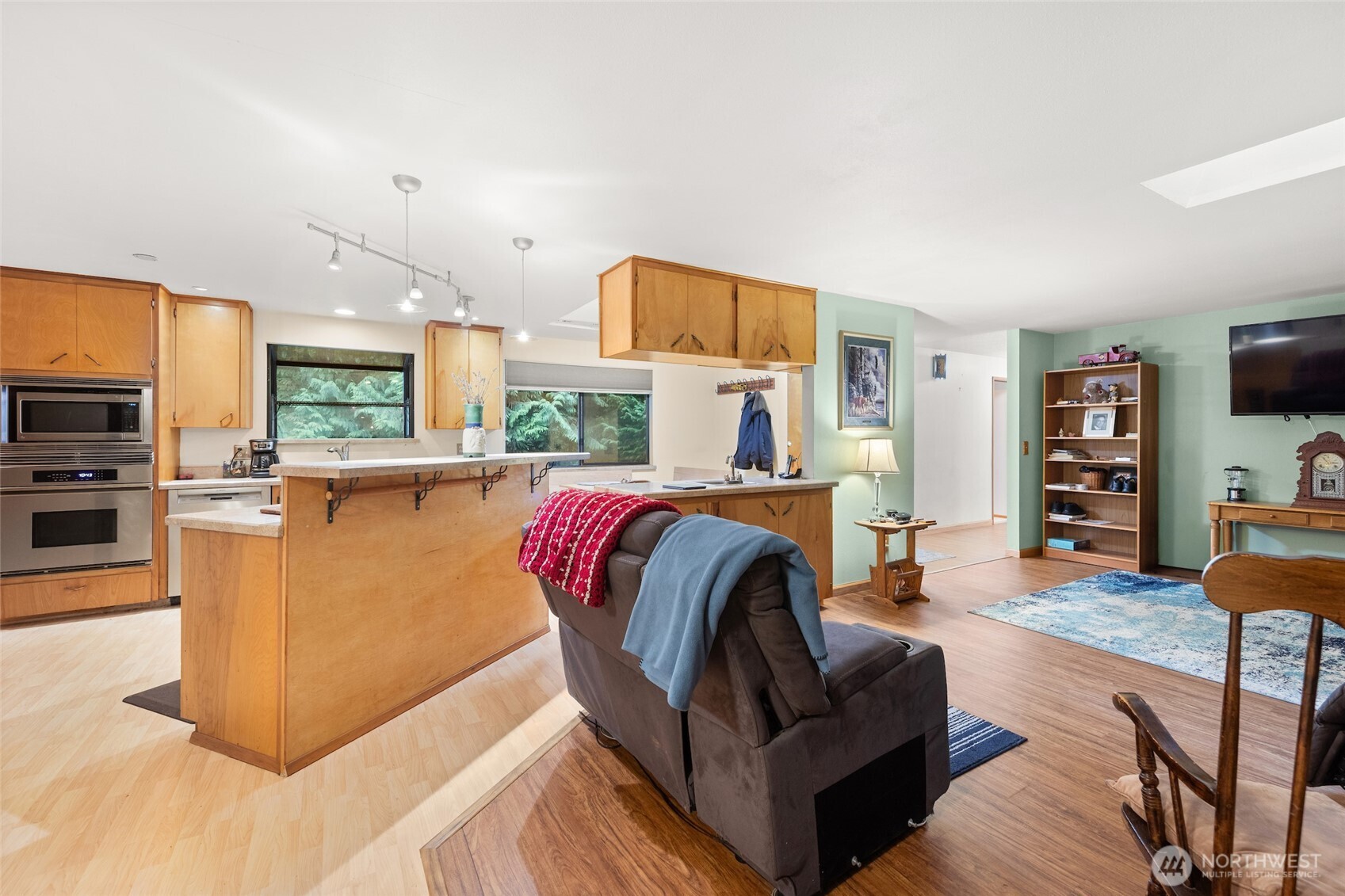 4617 200th Street Southeast Bothell, WA 98012 - Photo 14 of 39 a living room with furniture and a flat screen tv