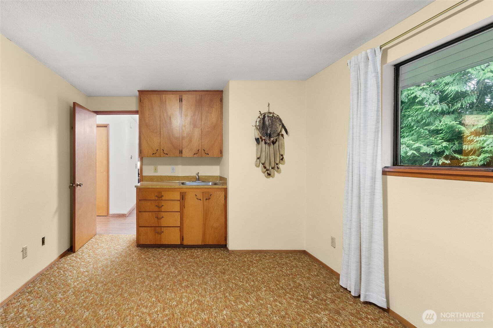 4617 200th Street Southeast Bothell, WA 98012 - Photo 22 of 39 a view of kitchen with window and refrigerator