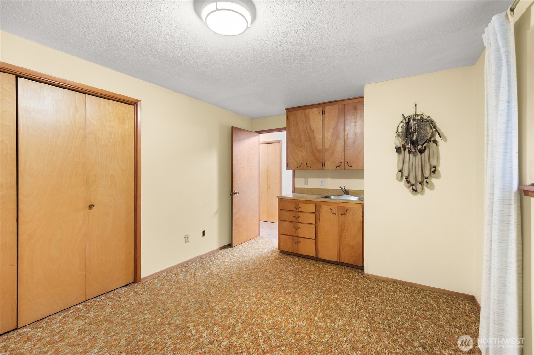 4617 200th Street Southeast Bothell, WA 98012 - Photo 23 of 39 a kitchen with a refrigerator and a stove