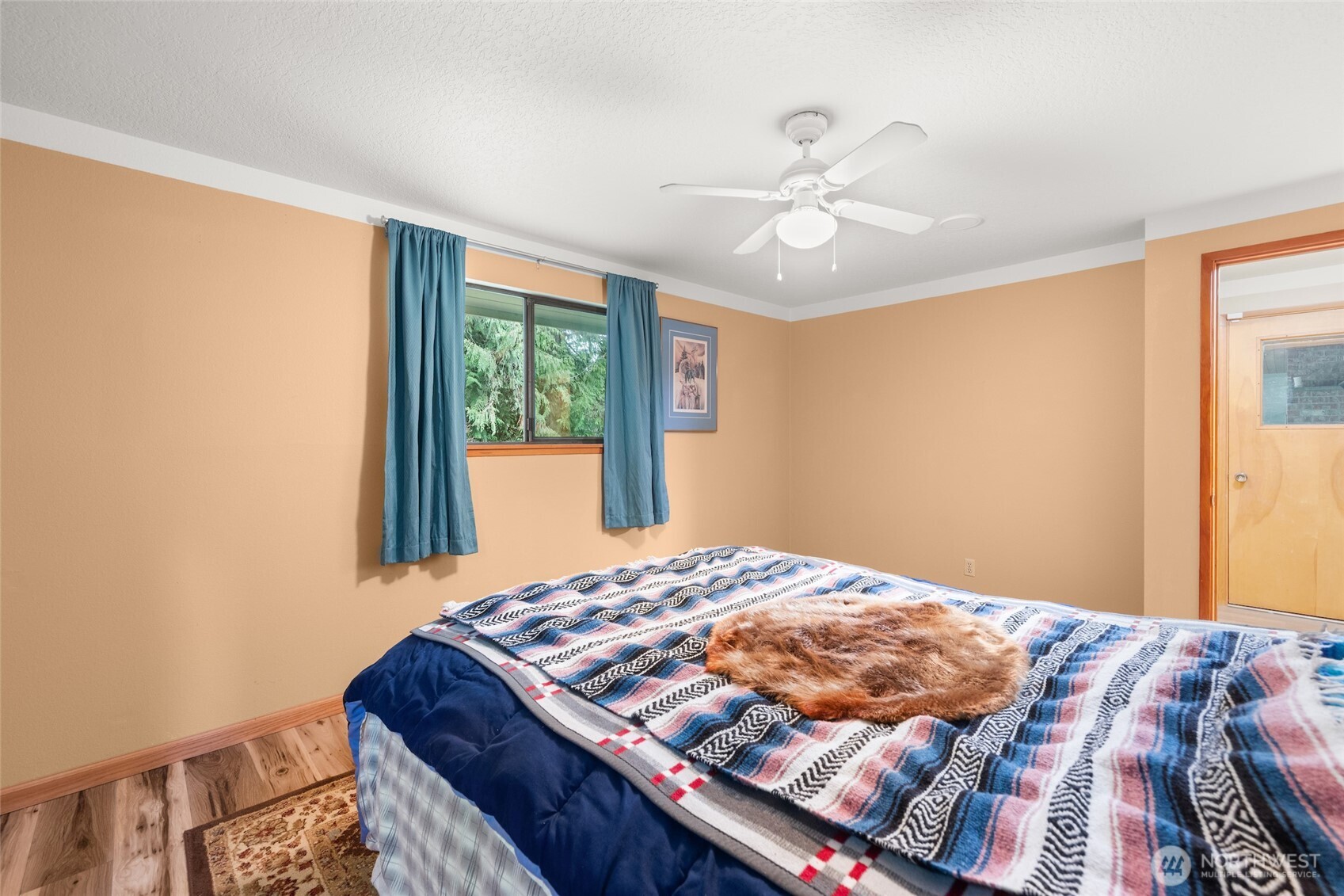 4617 200th Street Southeast Bothell, WA 98012 - Photo 28 of 39 a bedroom with a bed and a window