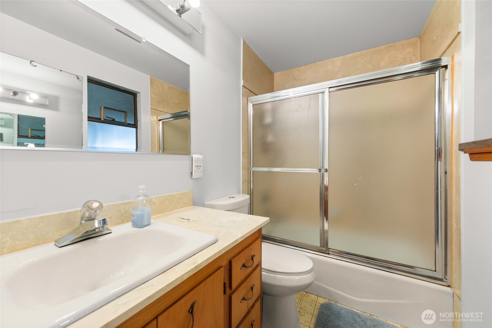 4617 200th Street Southeast Bothell, WA 98012 - Photo 30 of 39 a bathroom with a sink toilet and shower