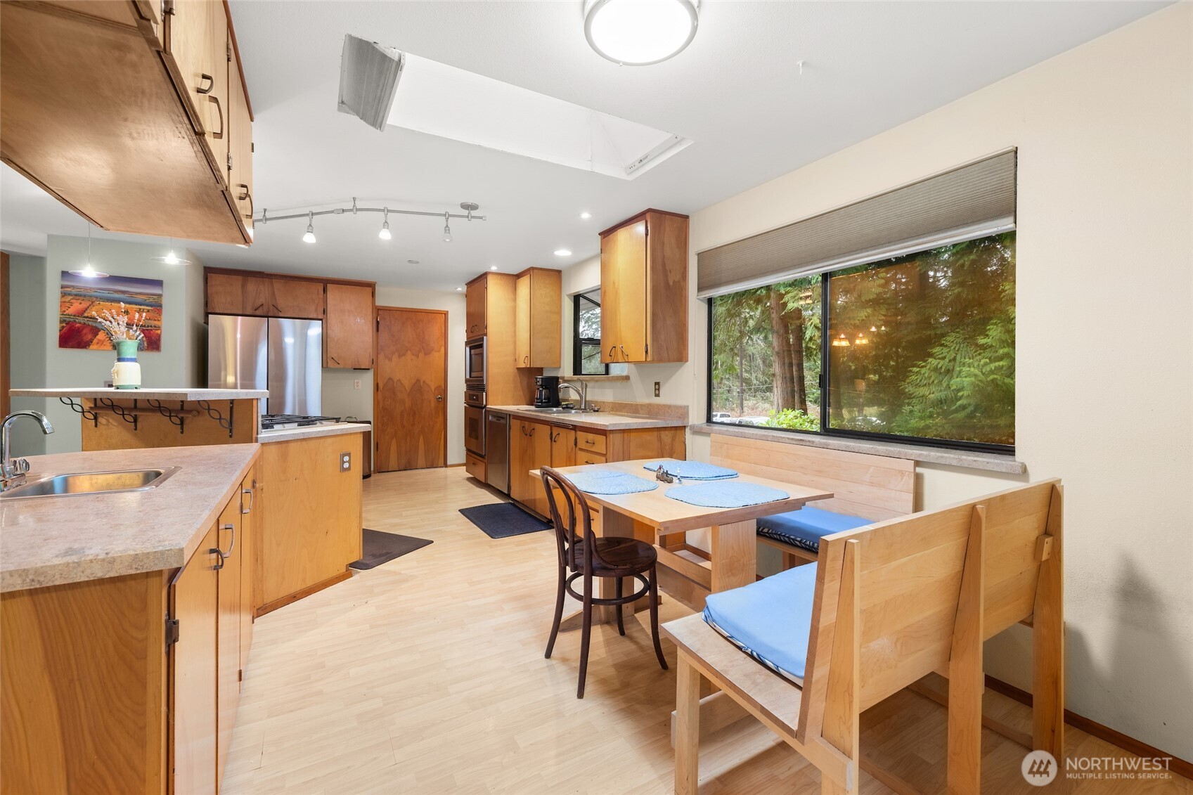 4617 200th Street Southeast Bothell, WA 98012 - Photo 4 of 39 a view of a dining room with furniture window and outside view