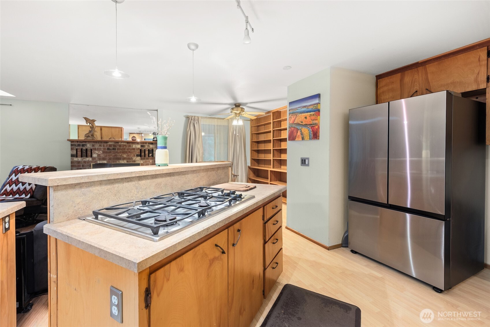 4617 200th Street Southeast Bothell, WA 98012 - Photo 6 of 39 a kitchen with stainless steel appliances granite countertop a refrigerator and a stove top oven