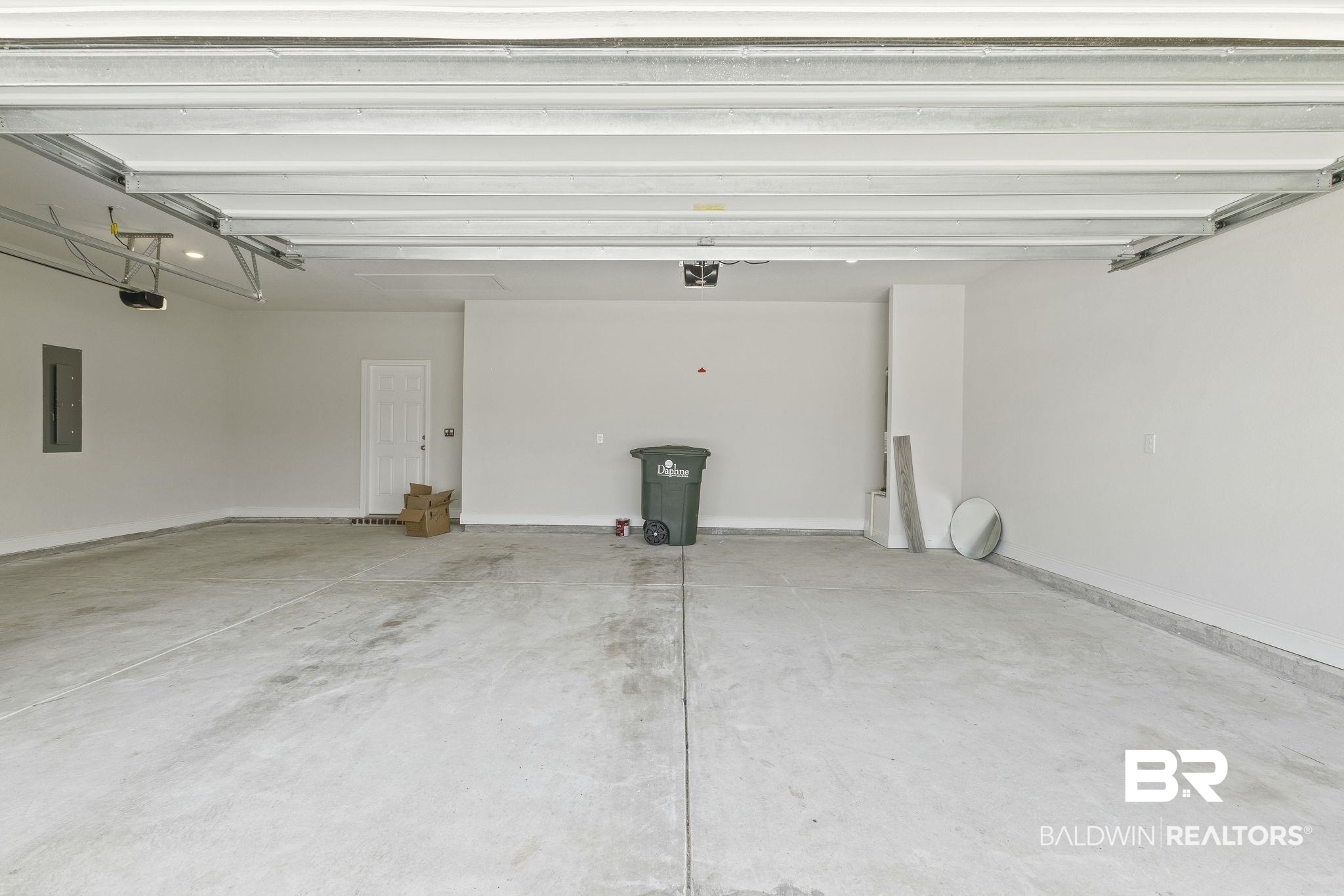11303 Genuine Risk Circle Daphne, AL 36526 - Photo 65 of 100 Garage featuring a garage door opener and electric panel