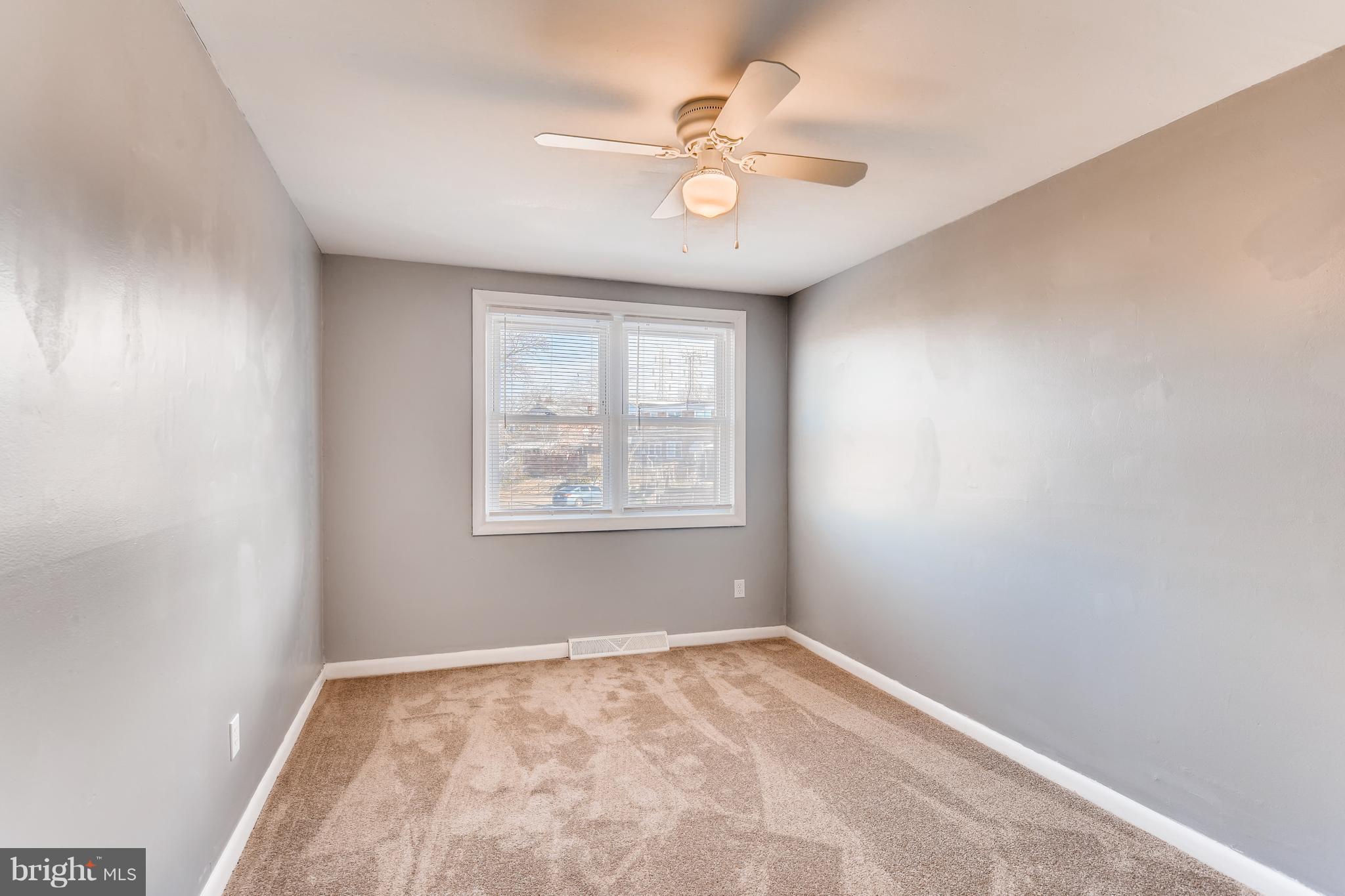 5505 Silverbell Road Baltimore, MD 21206 - Photo 12 of 21 Second BR w/w carpeting and ceiling fan