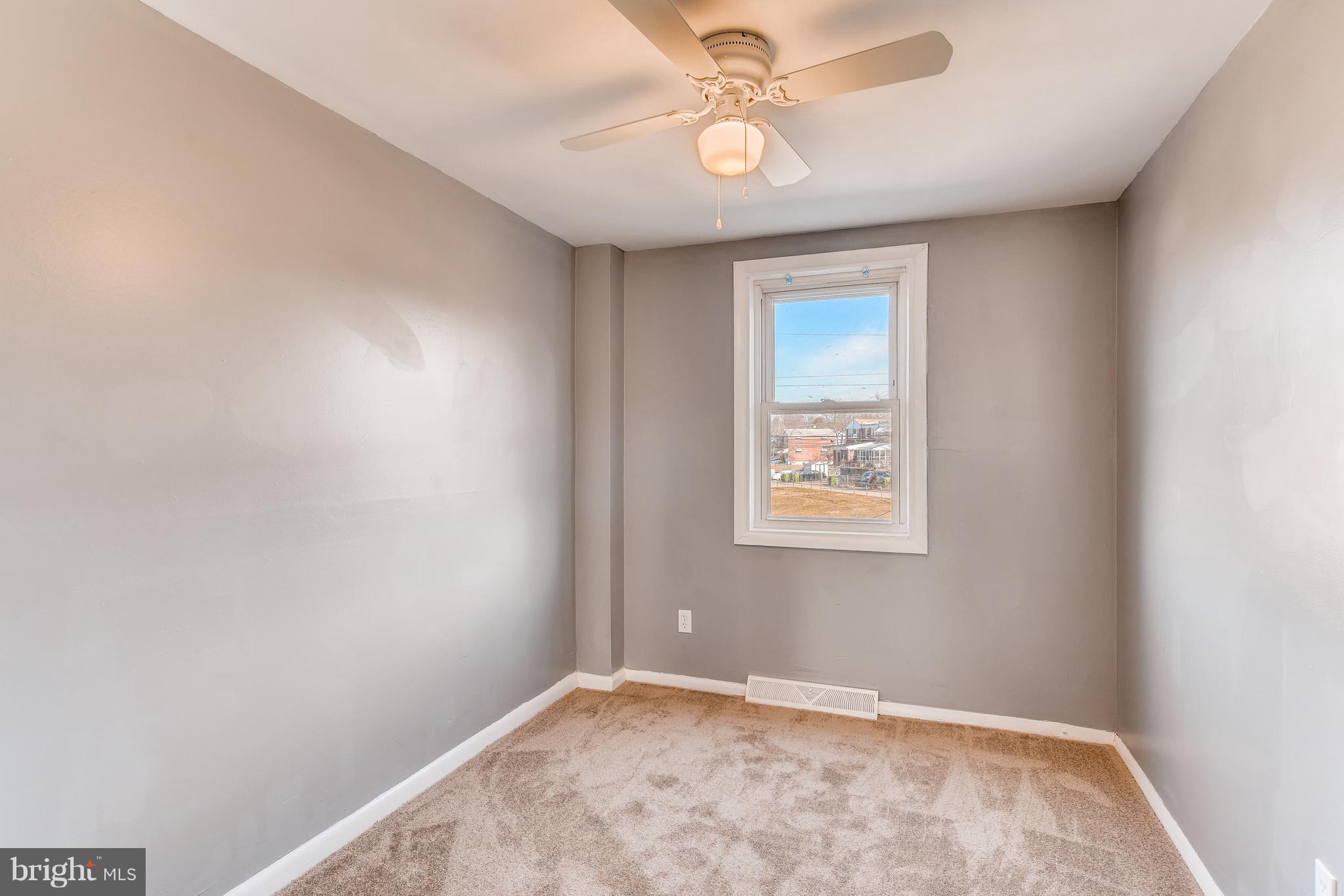 5505 Silverbell Road Baltimore, MD 21206 - Photo 14 of 21 Third BR on upper level with carpet & ceiling fan