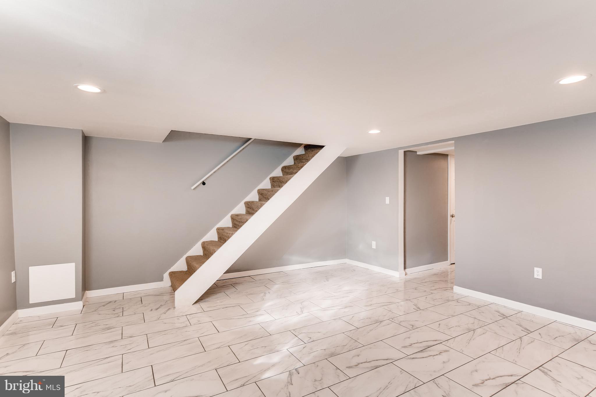 5505 Silverbell Road Baltimore, MD 21206 - Photo 15 of 21 Fully finished basement w/ neutral color palette