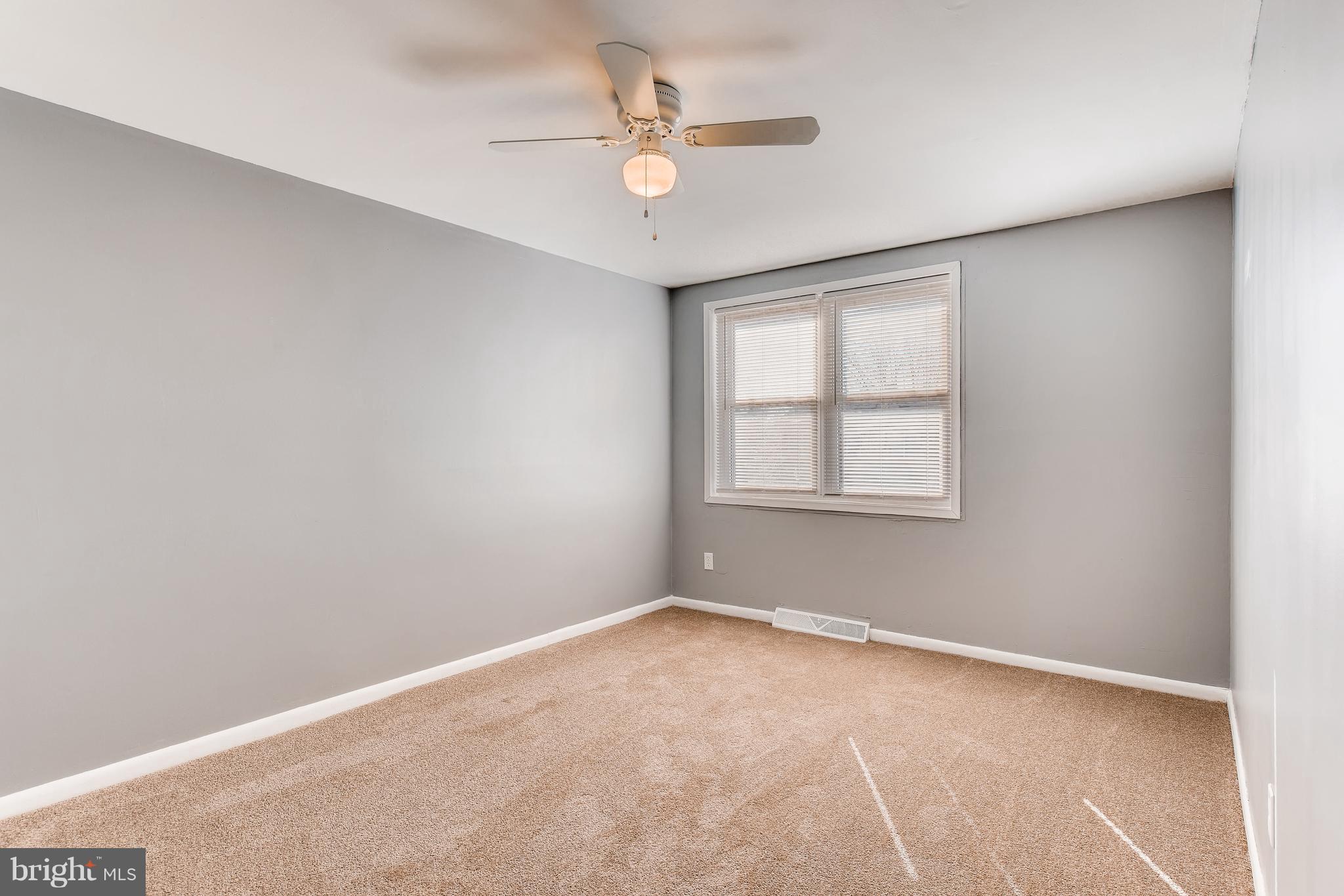 5505 Silverbell Road Baltimore, MD 21206 - Photo 9 of 21 Master BR with w/w carpeting, ceiling fan