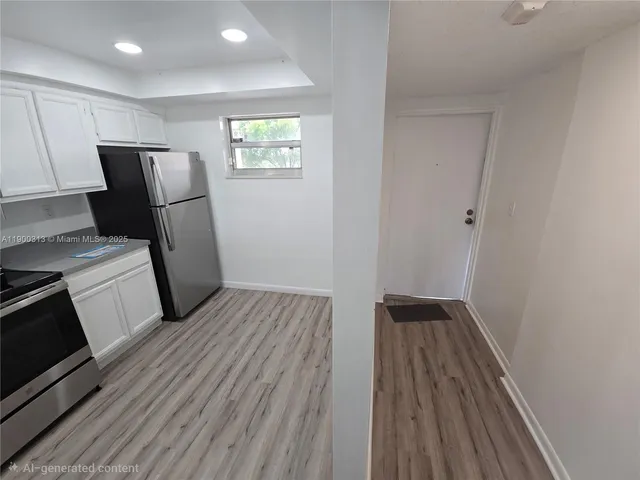 a view of a big room with windows and bathroom