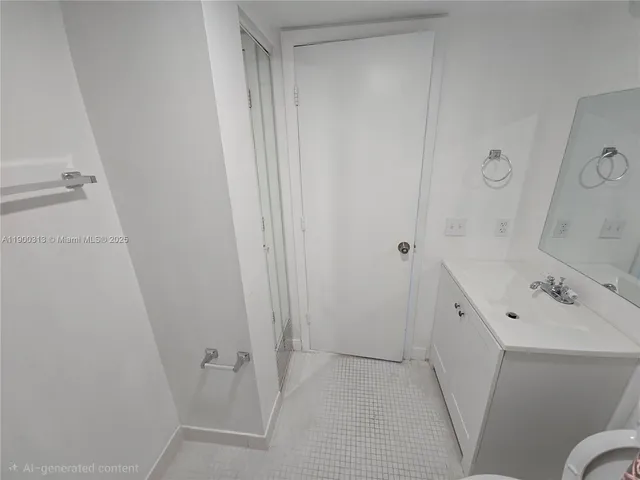 a bathroom with a black and blue shower