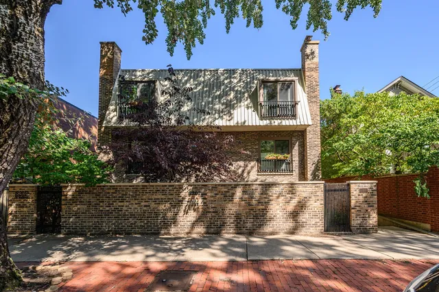front view of a house with a street