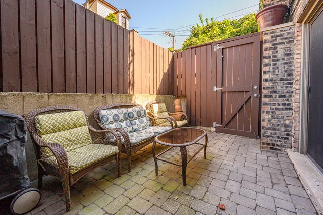 a living room with furniture and a gate