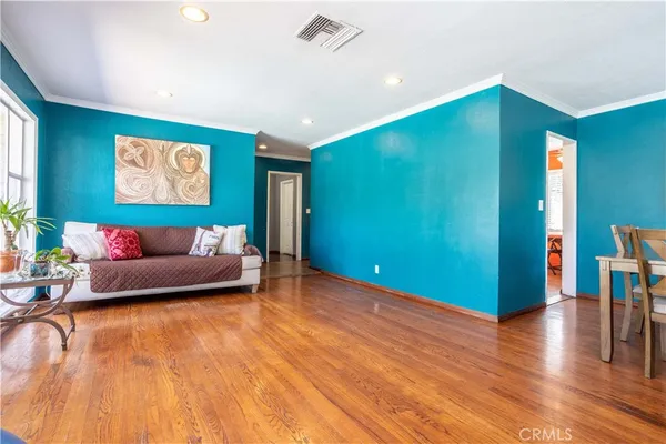 a view of a dining room with furniture and window