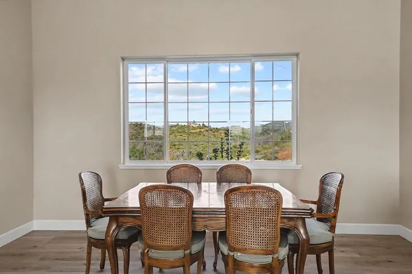 a view with cabinets a sink and dishwasher in a kitchen