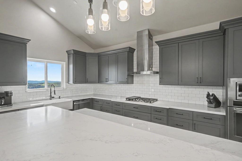 9515 Ham Luddy Road Mountain Ranch, CA 95246 - Photo 16 of 92 a kitchen with a sink and cabinets