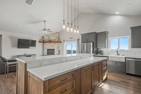 a bedroom with a large bed and a large window