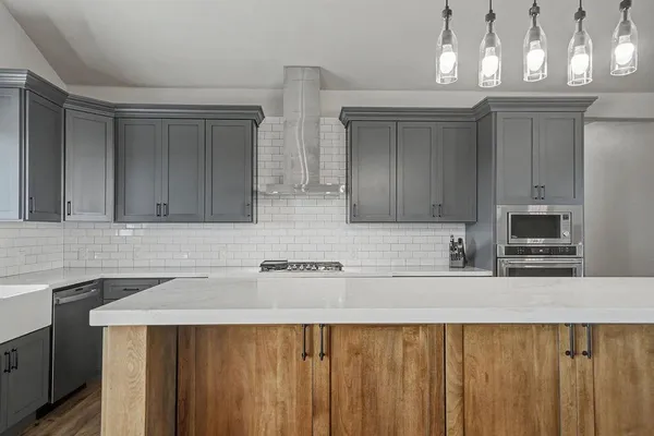 a white toilet sitting next to a shower curtain