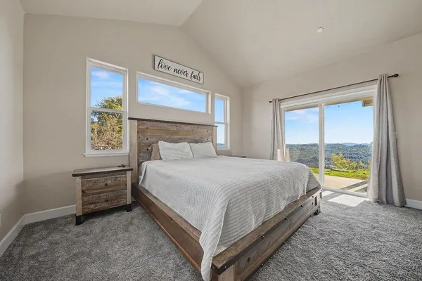 a bathroom with a shower and a sink