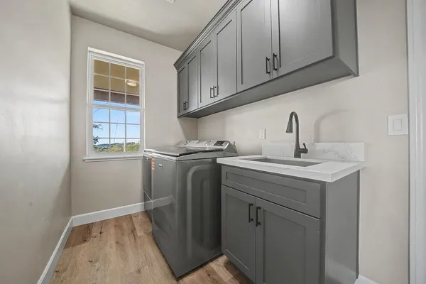 a view of a backyard with sitting area