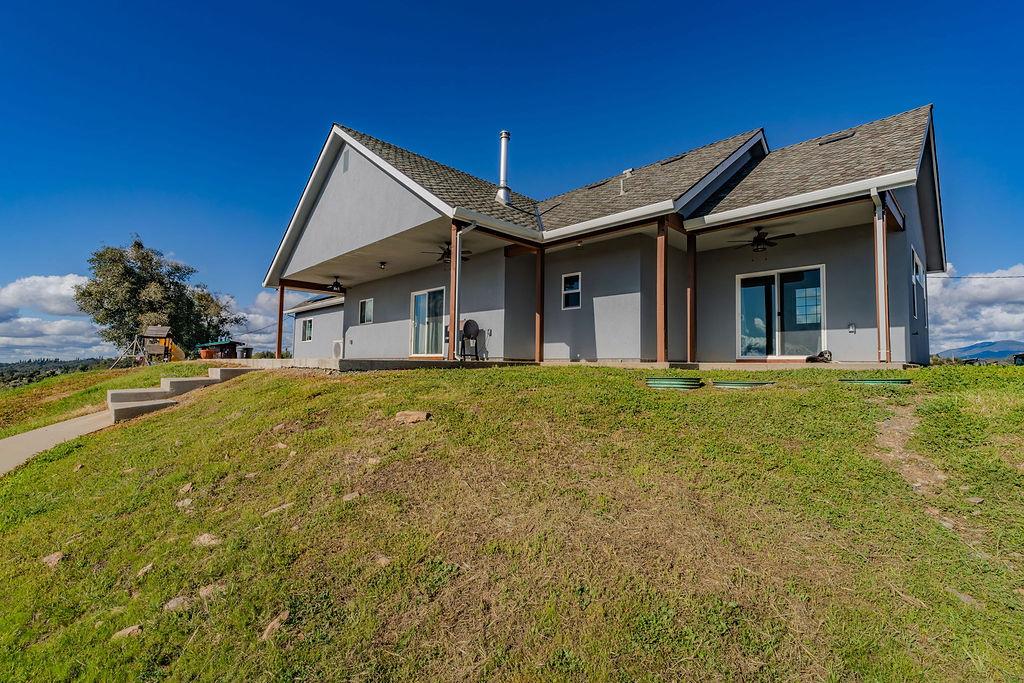 9515 Ham Luddy Road Mountain Ranch, CA 95246 - Photo 46 of 92 a front view of a house with a yard