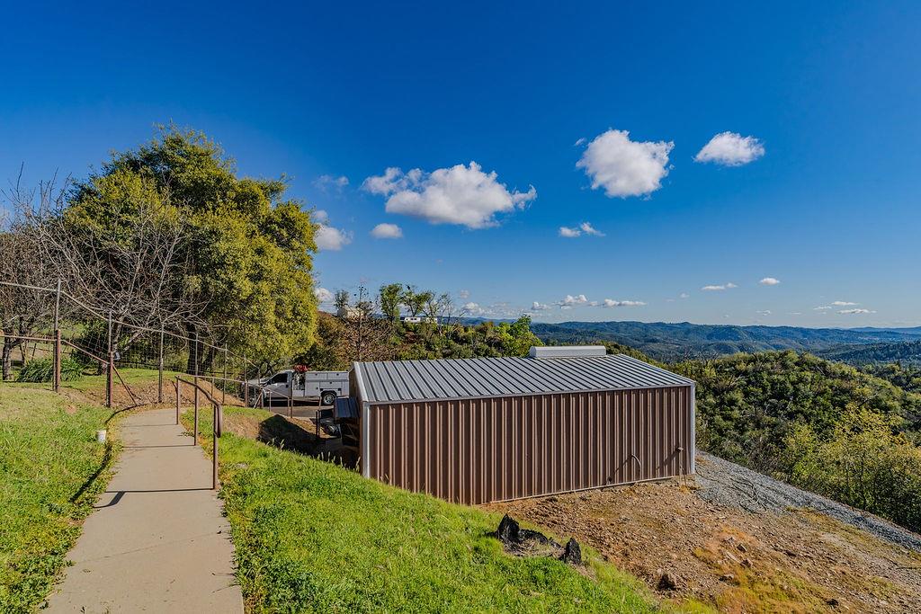 9515 Ham Luddy Road Mountain Ranch, CA 95246 - Photo 47 of 92 a view of a balcony with wooden floor