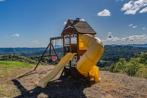 a bathroom with a shower and a sink