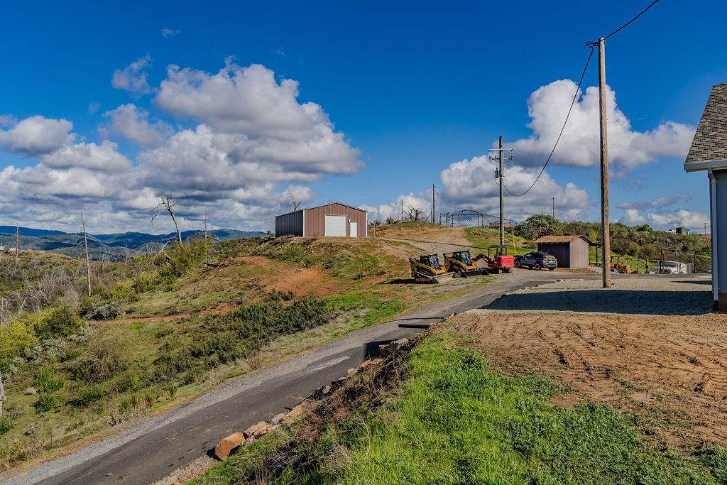 9515 Ham Luddy Road Mountain Ranch, CA 95246 - Photo 53 of 92 a view of a pathway both side of building