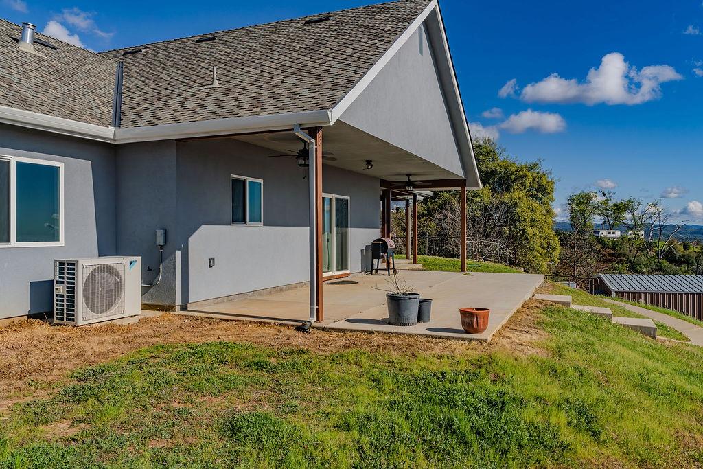 9515 Ham Luddy Road Mountain Ranch, CA 95246 - Photo 58 of 92 a view of a house with backyard and sitting area