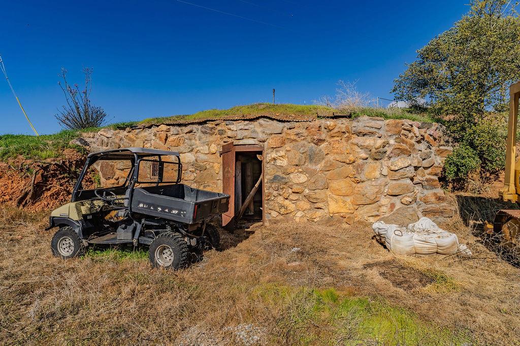 9515 Ham Luddy Road Mountain Ranch, CA 95246 - Photo 64 of 92 a view of a backyard with sitting area