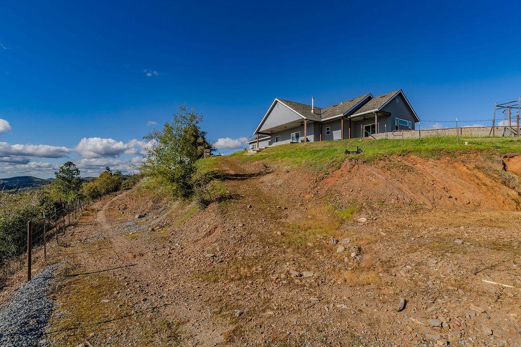 9515 Ham Luddy Road Mountain Ranch, CA 95246 - Photo 68 of 92 a house view with a garden space