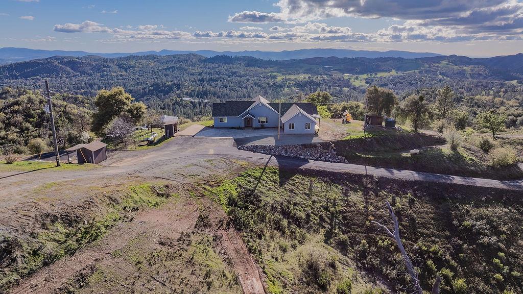 9515 Ham Luddy Road Mountain Ranch, CA 95246 - Photo 74 of 92 a view of a house with a yard