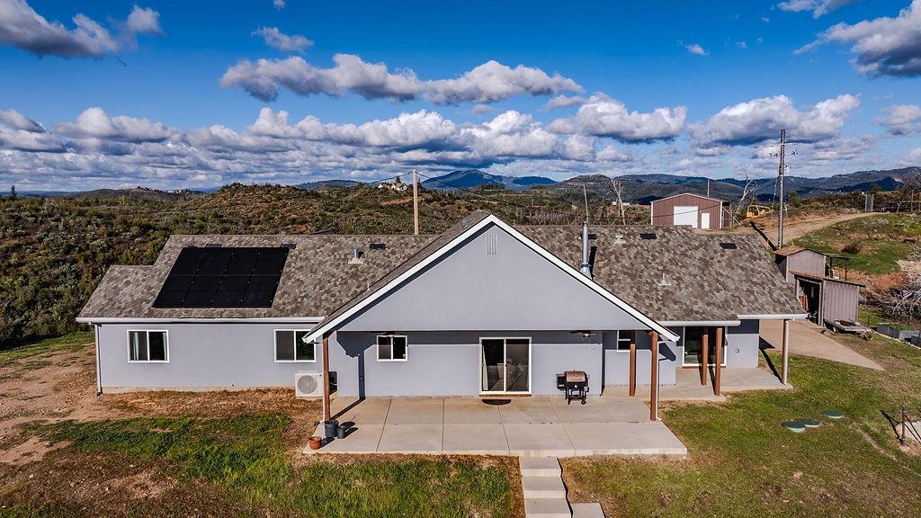 9515 Ham Luddy Road Mountain Ranch, CA 95246 - Photo 83 of 92 front view of a house with a yard
