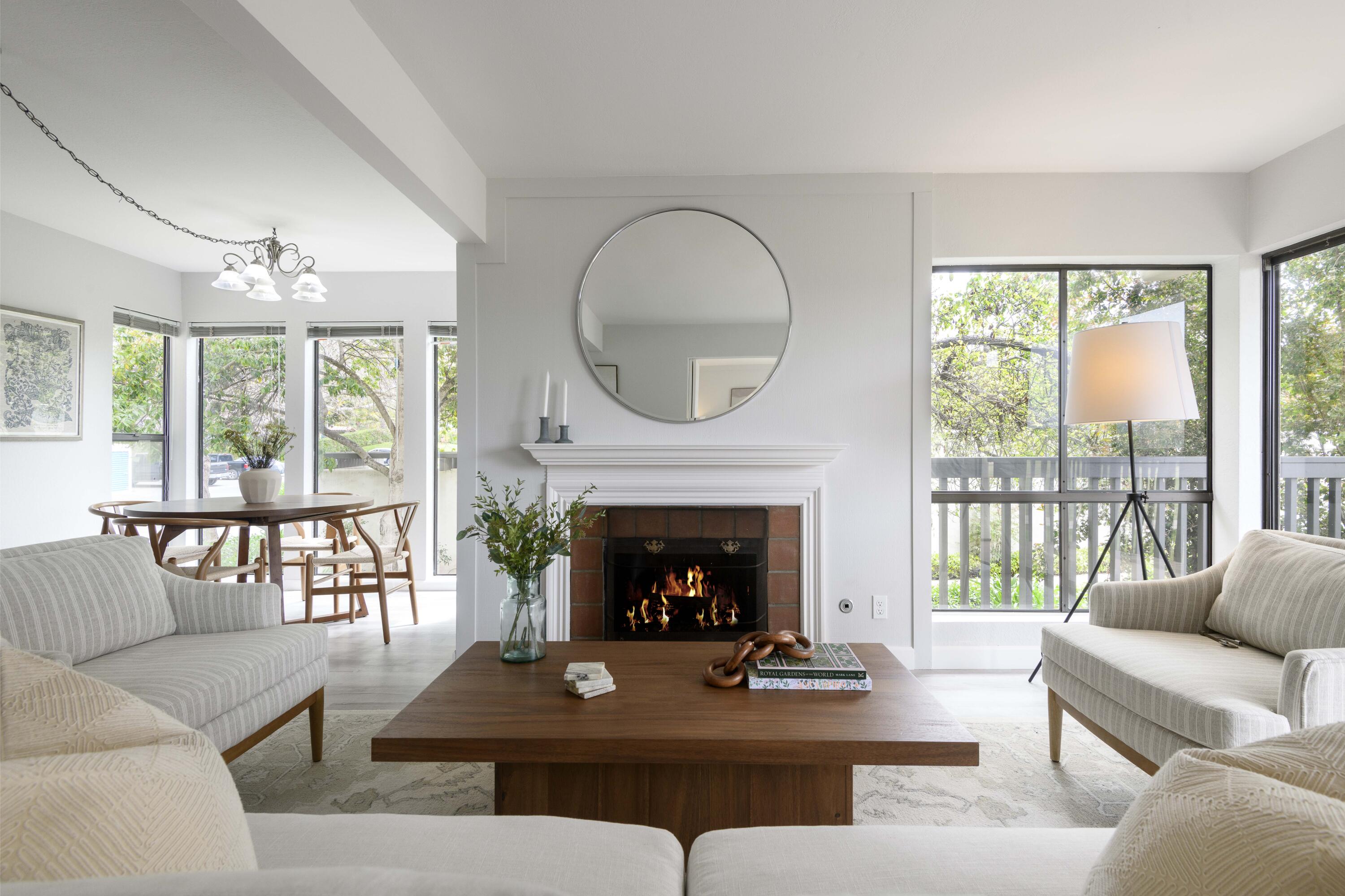 3375 Foothill Road, Unit 1121 Carpinteria, CA 93013 - Photo 1 of 24 a living room with furniture and a fireplace