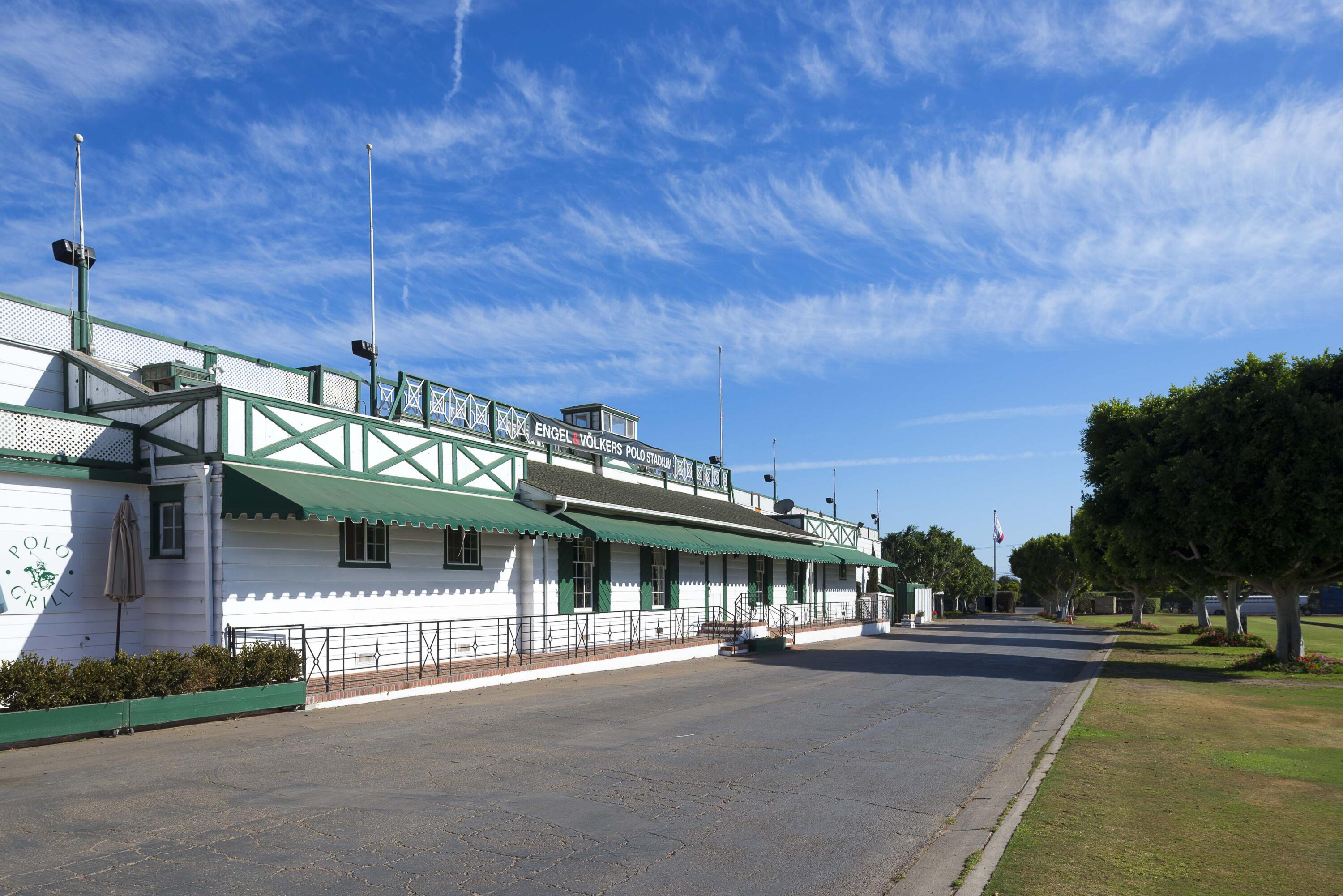 3375 Foothill Road, Unit 1121 Carpinteria, CA 93013 - Photo 23 of 24 a view of a building with a garden and parking area