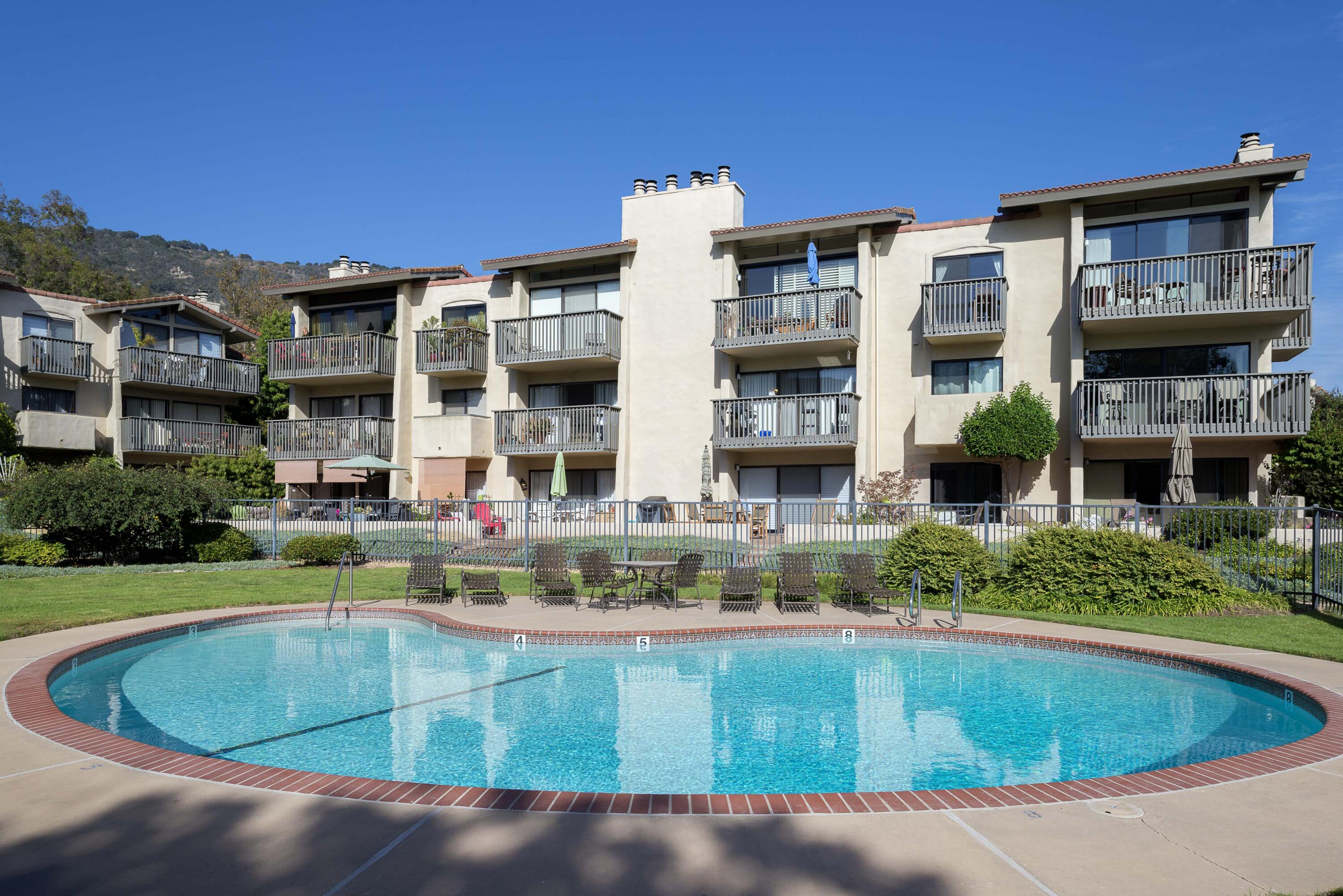 3375 Foothill Road, Unit 1121 Carpinteria, CA 93013 - Photo 3 of 24 a view of outdoor space yard swimming pool and fire pit