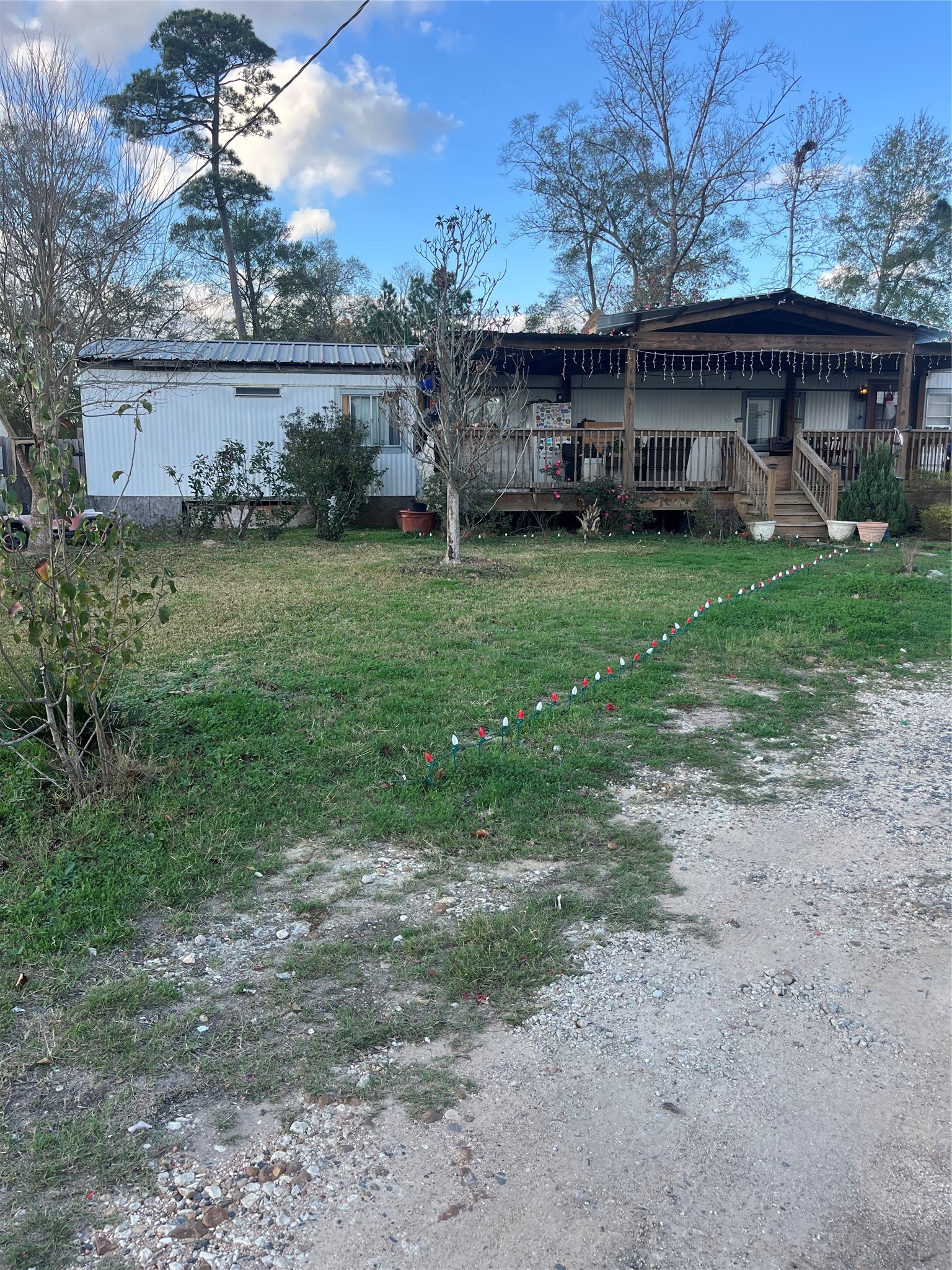 a view of a house with a back yard